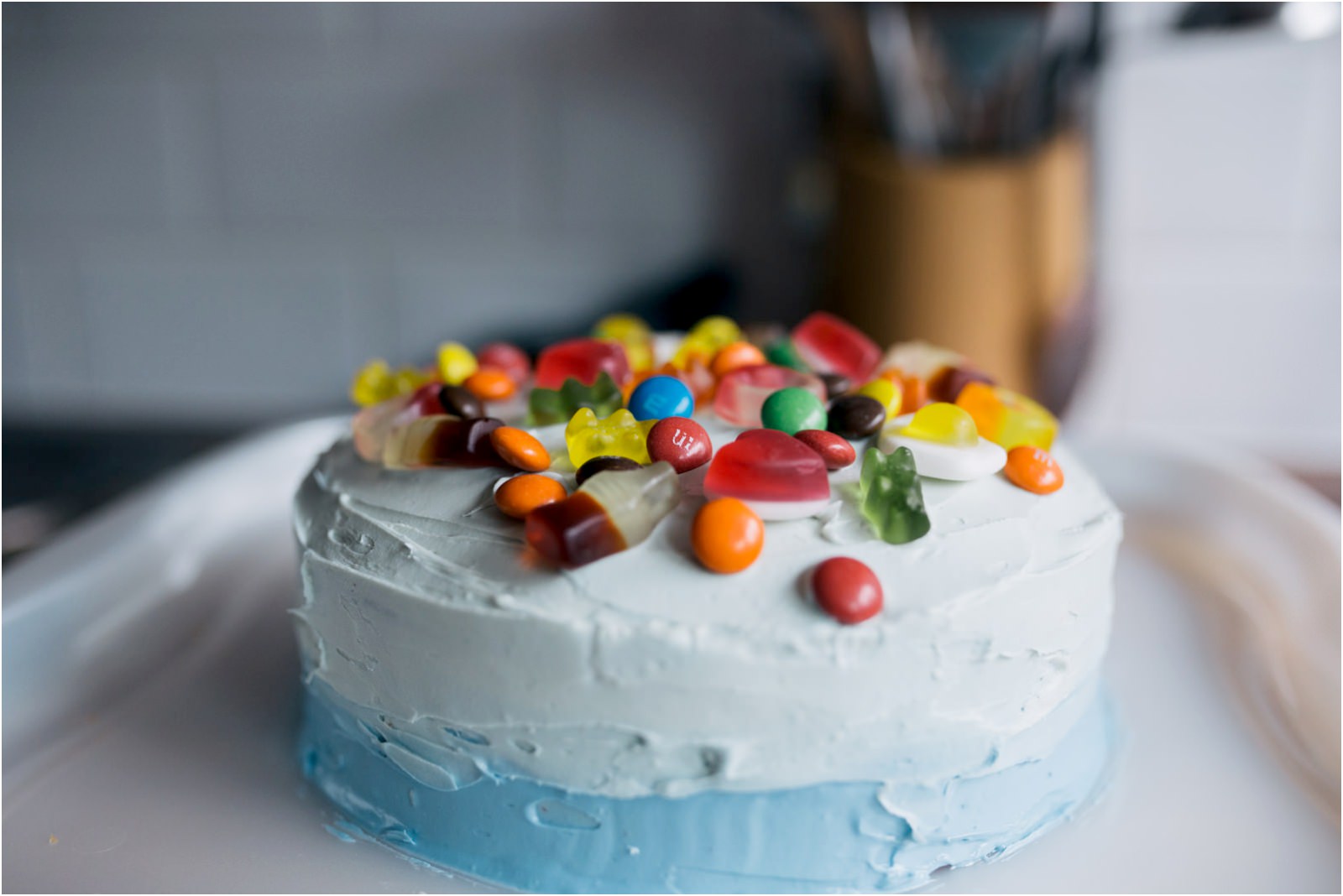 ombre style cake icing topped with sweets