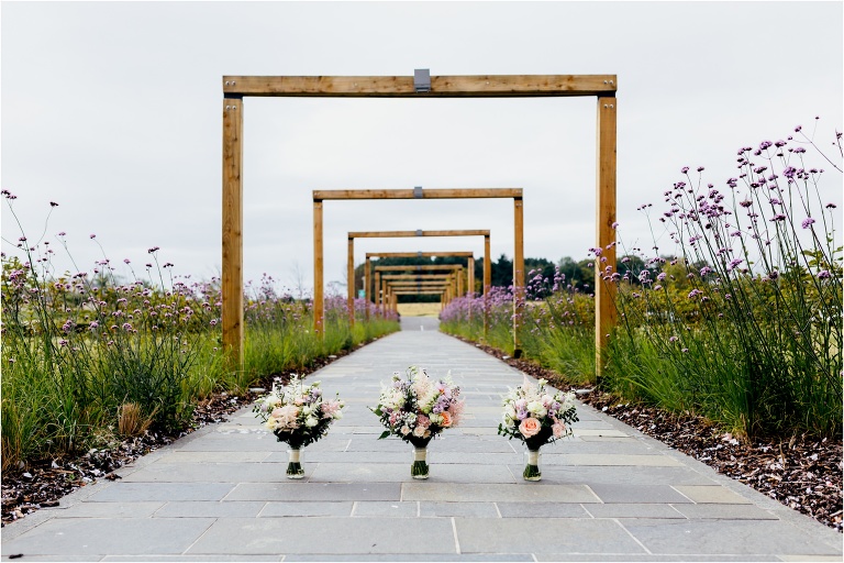 floral-bouquets-arranged-symmetrically-path