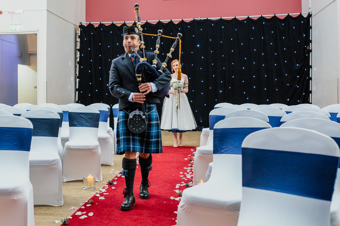 bride-piped-down-aisle