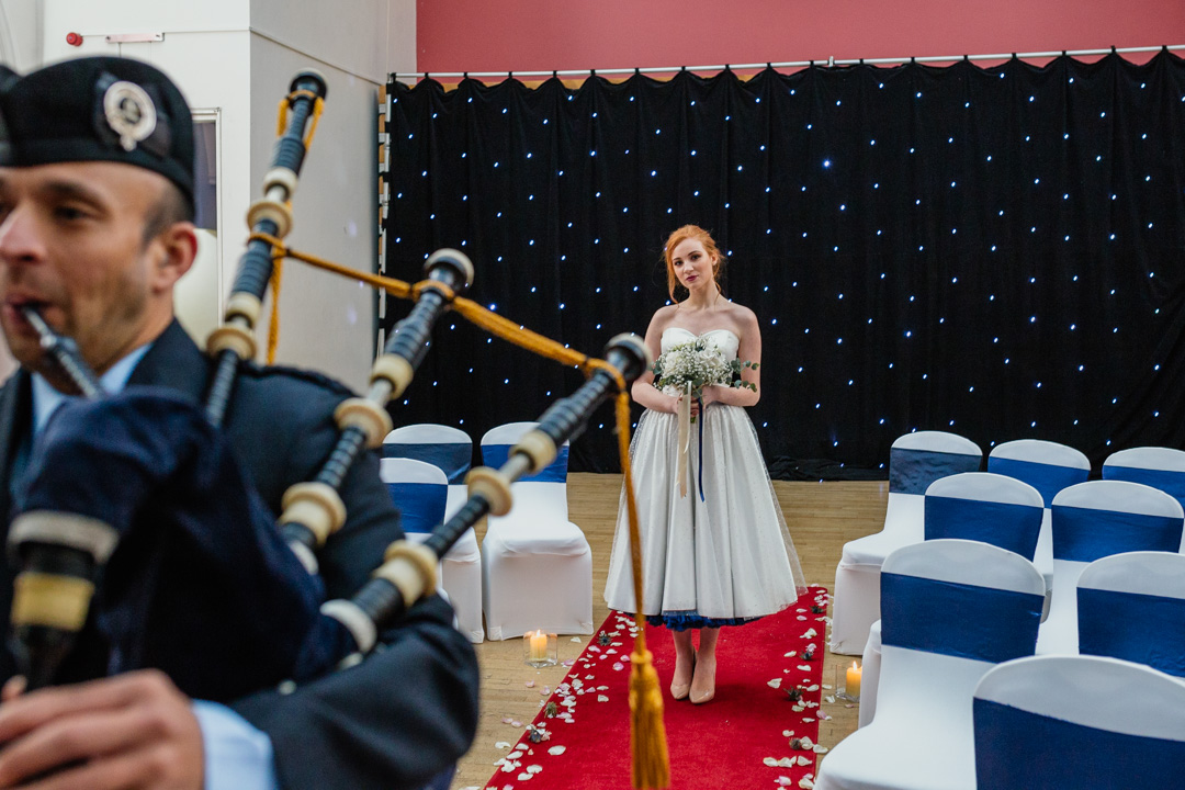 bride-piped-down-aisle-wedding