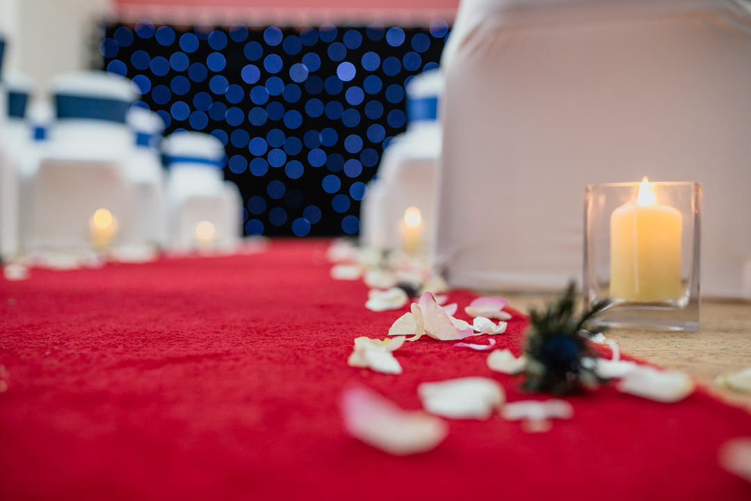 scattered-flower-petals-down-aisle