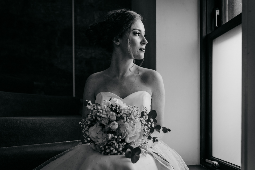 black-white-bride-holding-bouquet