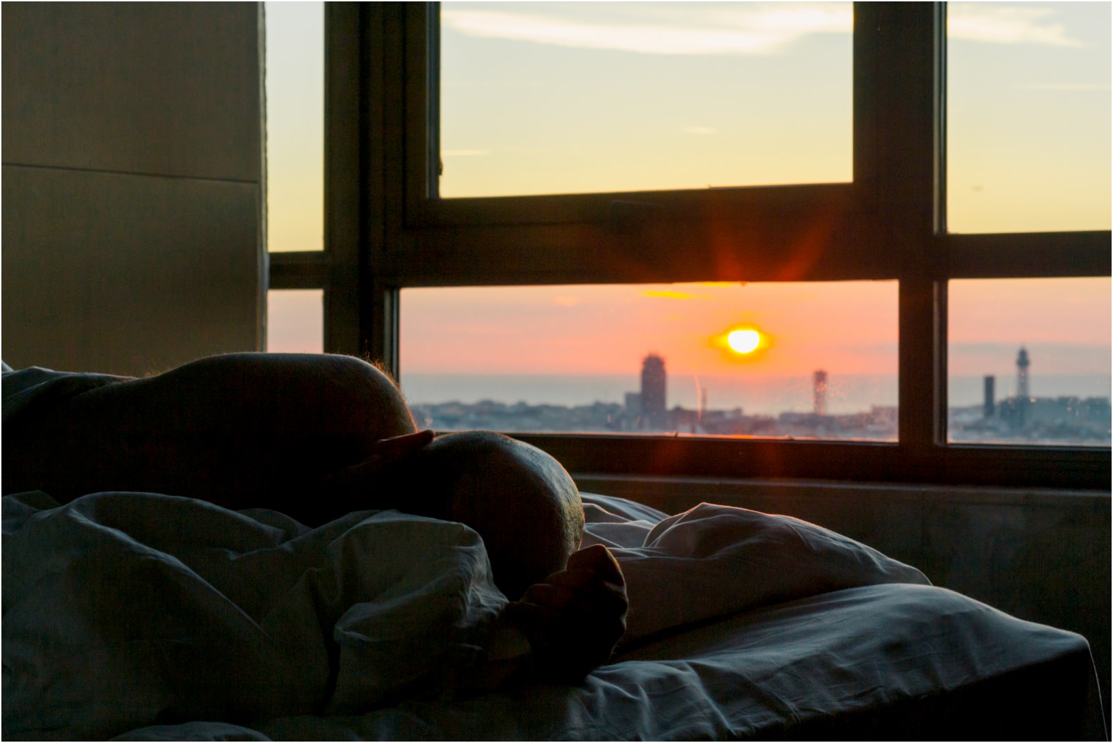 sunrise-over-barcelona-hotel-room