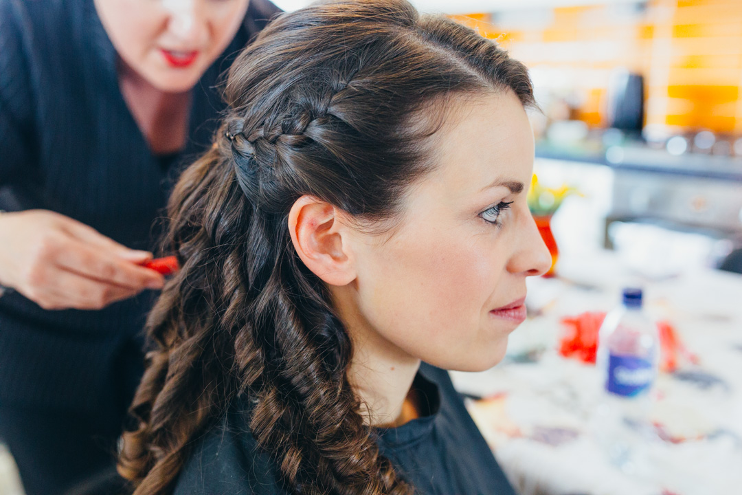 bride-having-hair-curled