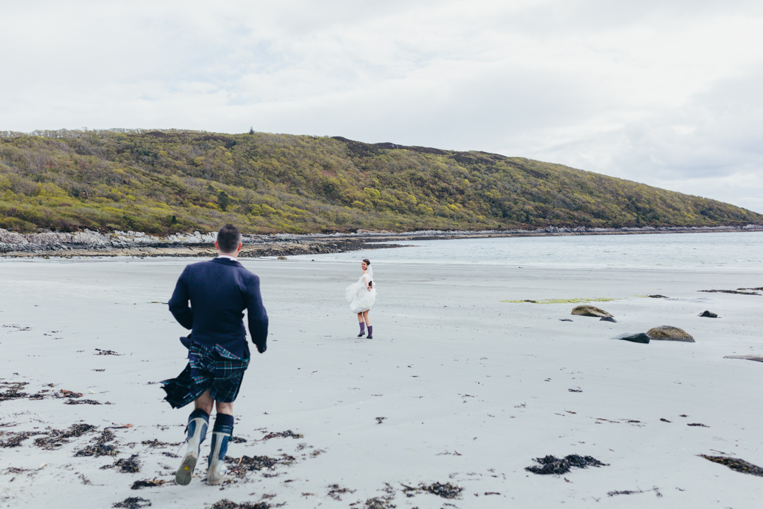 man-running-towards-woman-on-scottish-beach