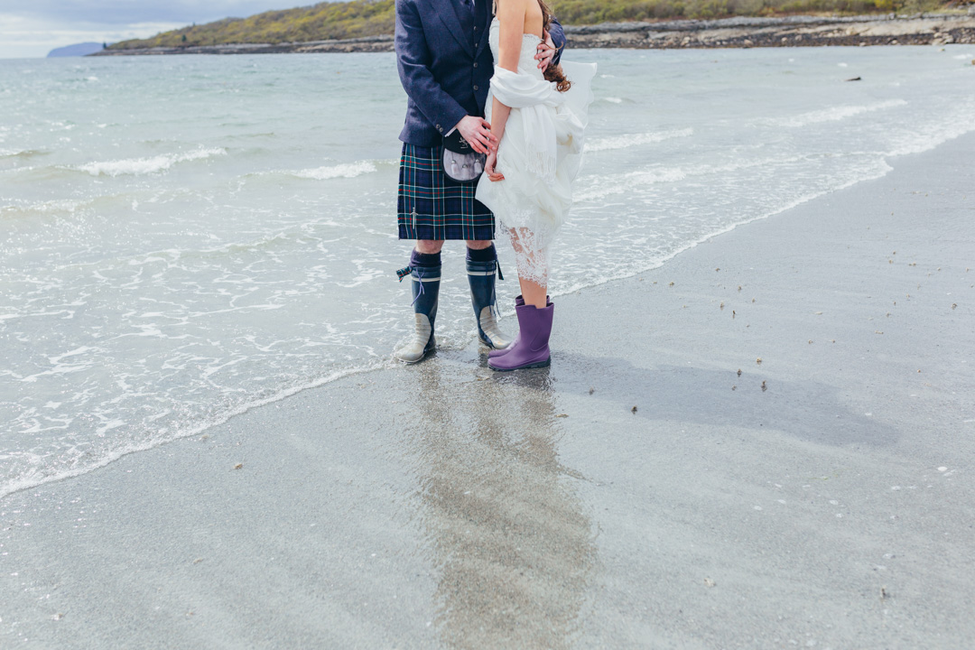 man-woman-wearing-wellington-boots-lochnell-beach