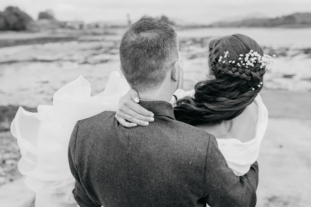 back-of-husband-carrying-wife