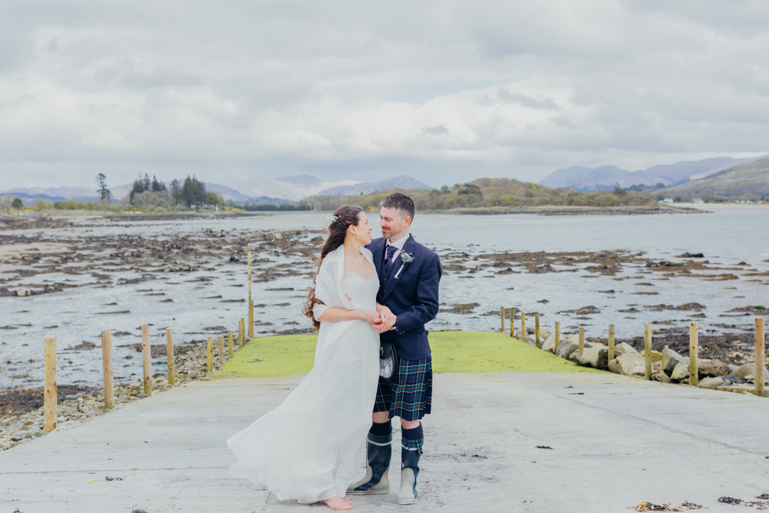 husband-wife-embracing-lochnell-beach