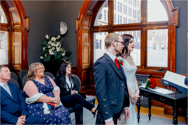 bride-groom-ceremony-guests-watching