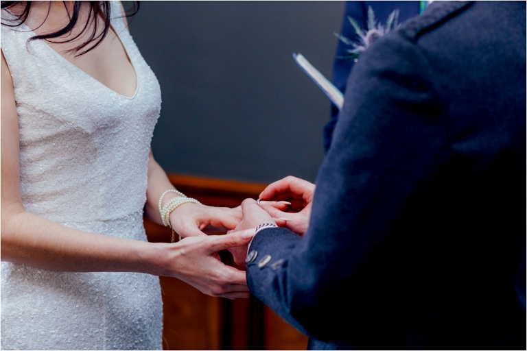 bride-groom-exchanging-rings