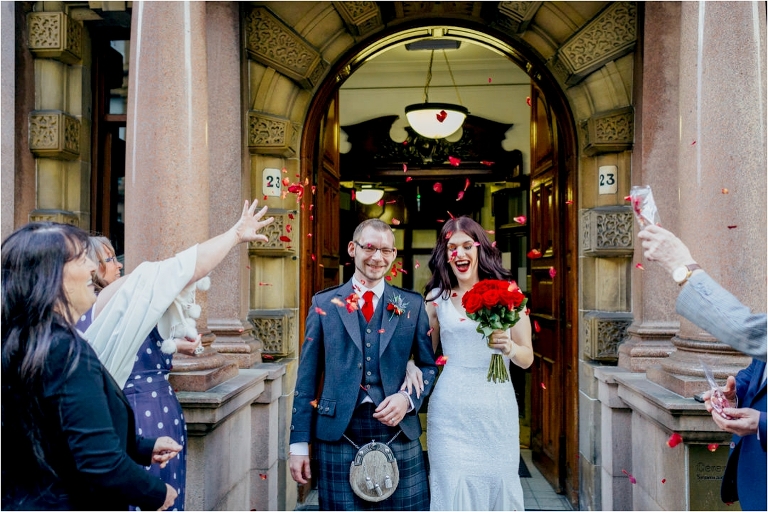 married-couple-have-rose-petal-confetti-thrown