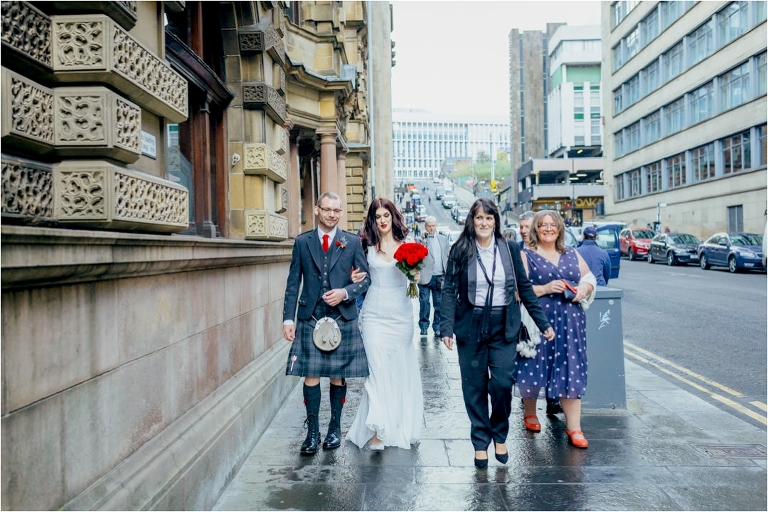 married-couple-walk-towards-george-square-glasgow