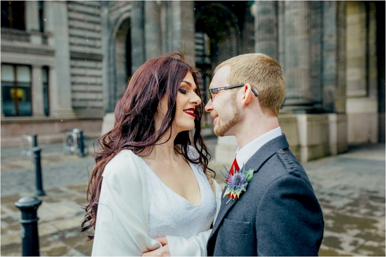 couple-hugging-smiling-rain-glasgow