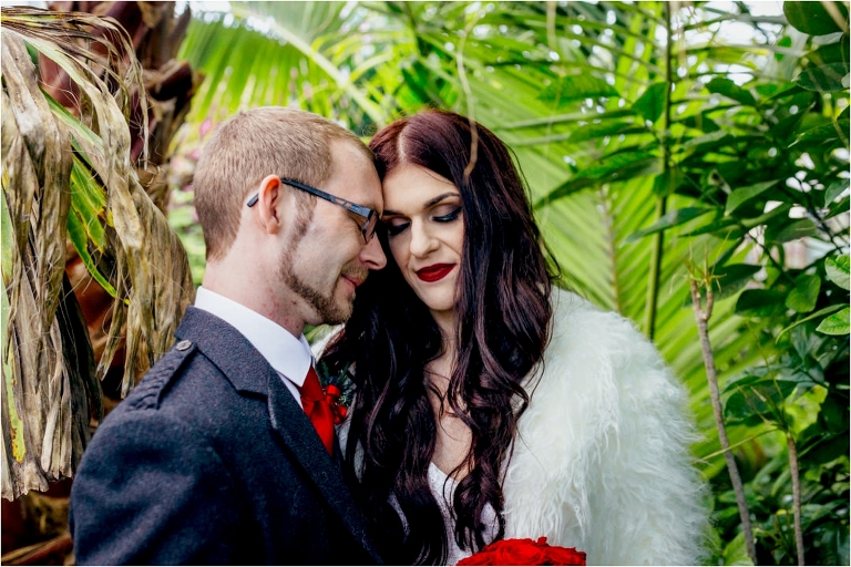 couple-embracing-greenhouse-viewpark-gardens