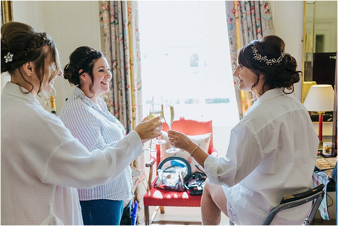 bride-bridesmaids-champagne-glasses