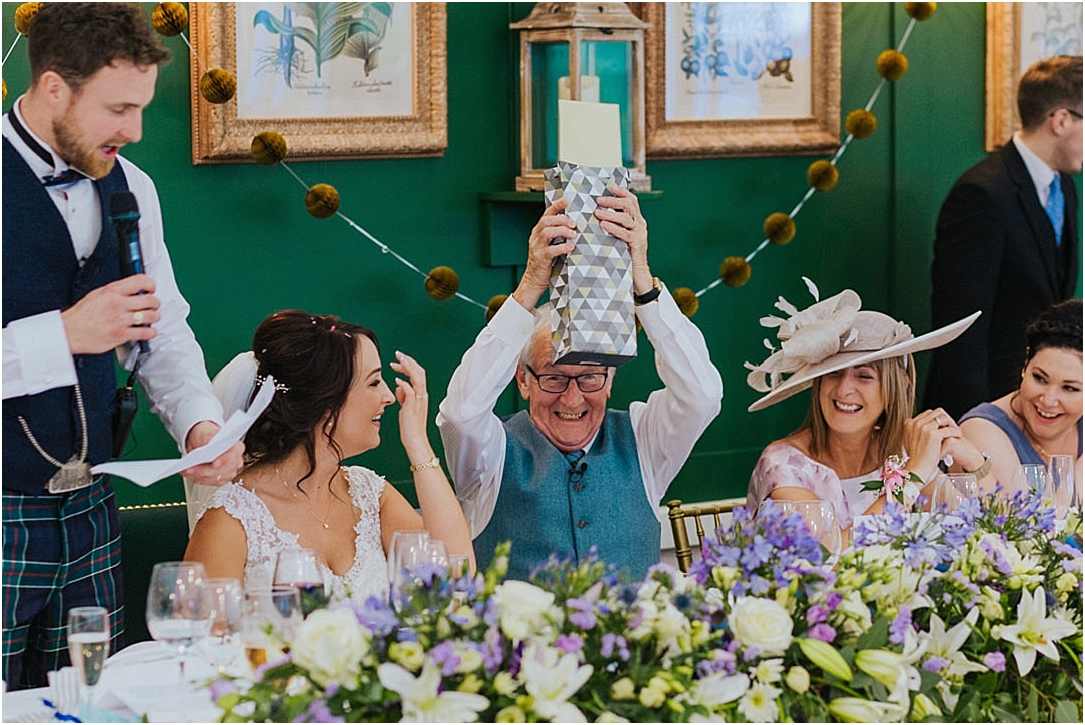 father-of-bride-receiving-wedding-gift