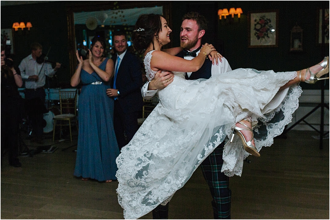 groom-picking-bride-up-spinning