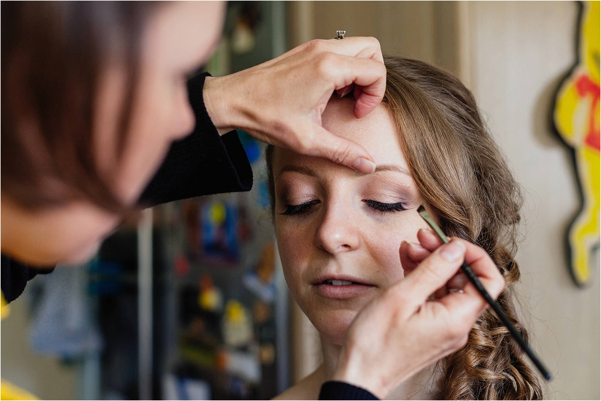 woman-having-make-up-put-on