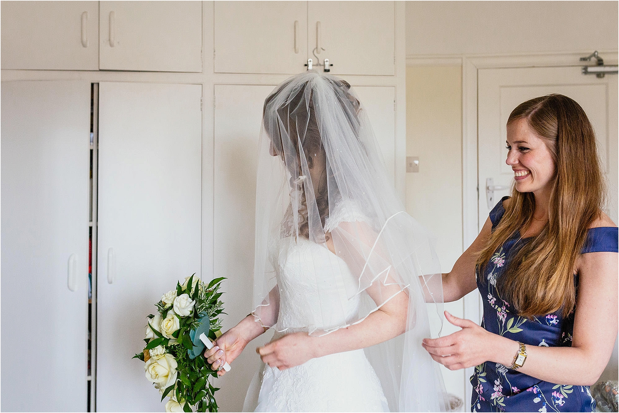 bride-putting-on-veil