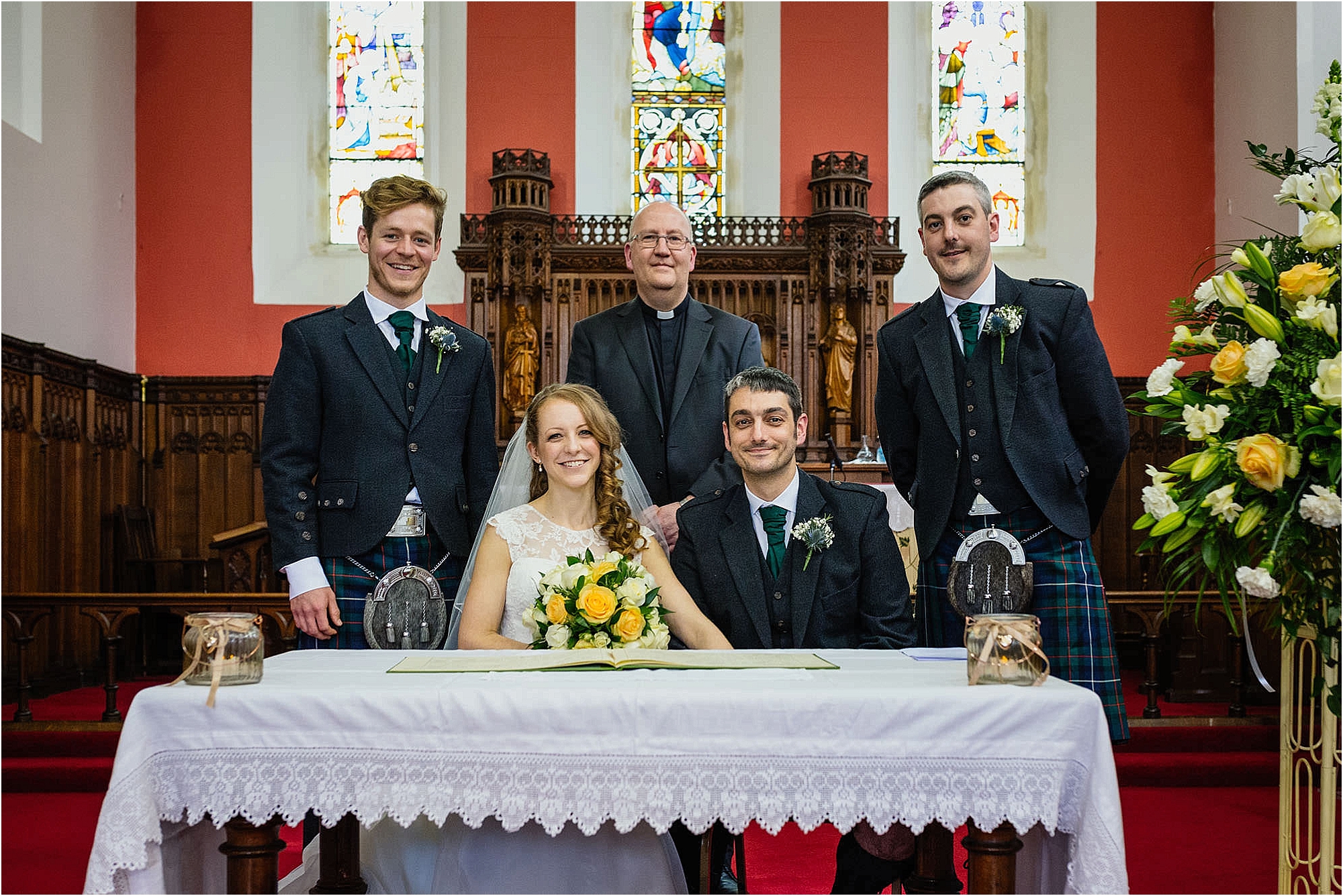 bride-groom-signing-register