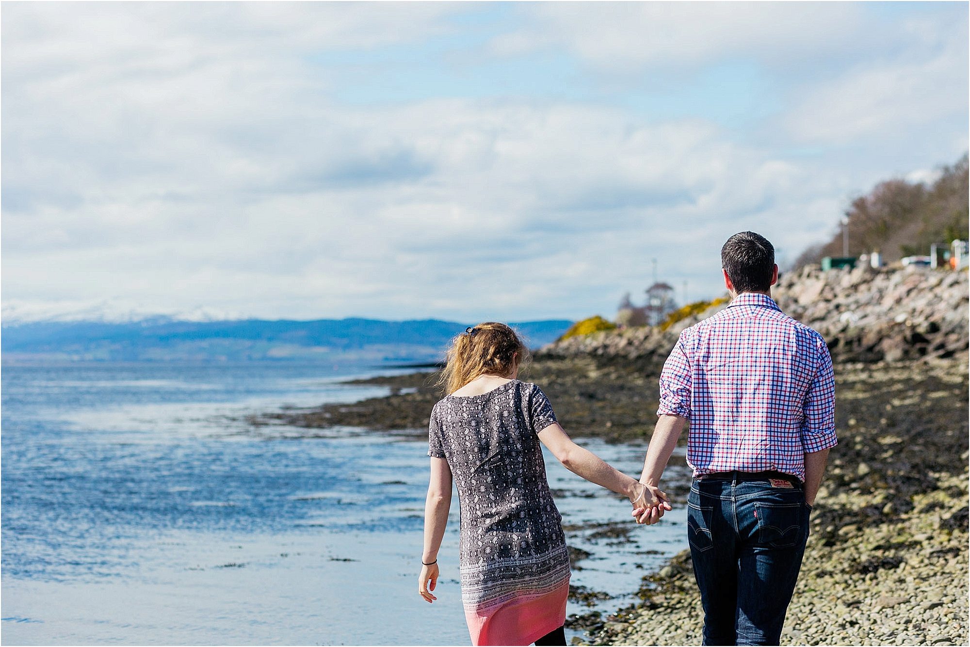 couple-walking-on-beach-inverness