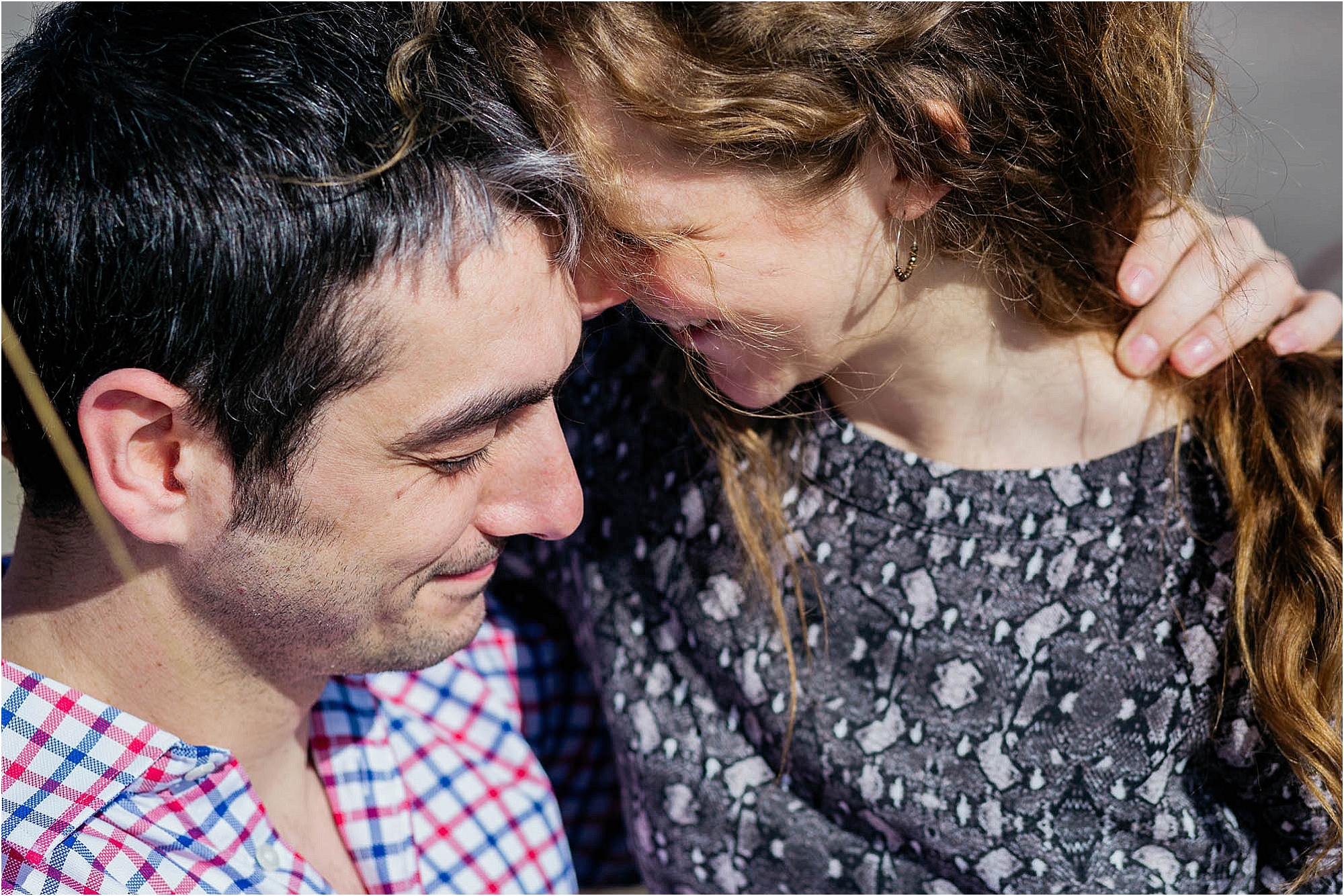 couple-cuddling-smiling