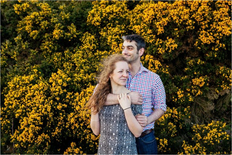 couple-cuddling-engagement-shoot