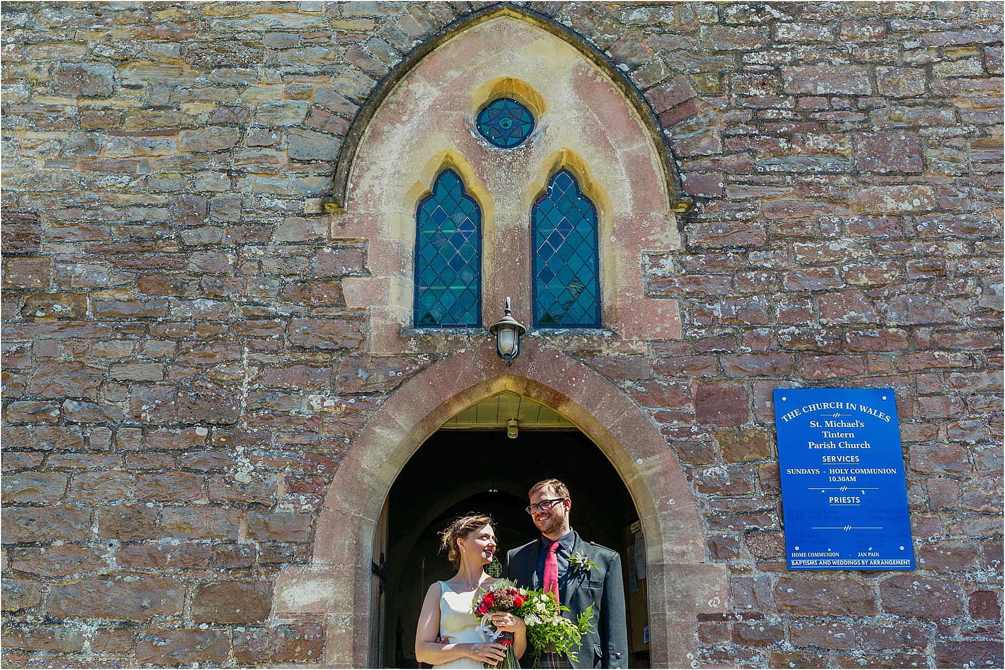 bride-groom-outside-st-michaels-church-tintern