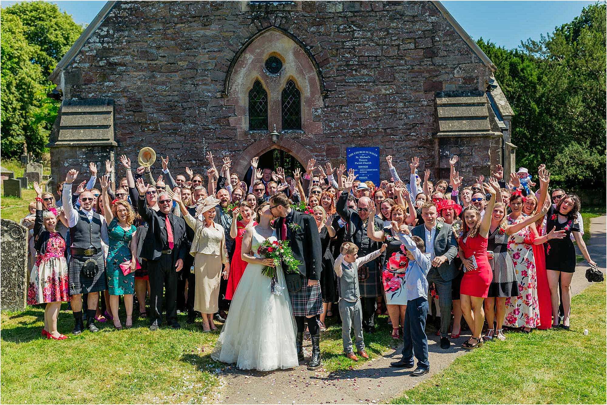 wedding-group-shot-outside-st-michaels-church-tintern