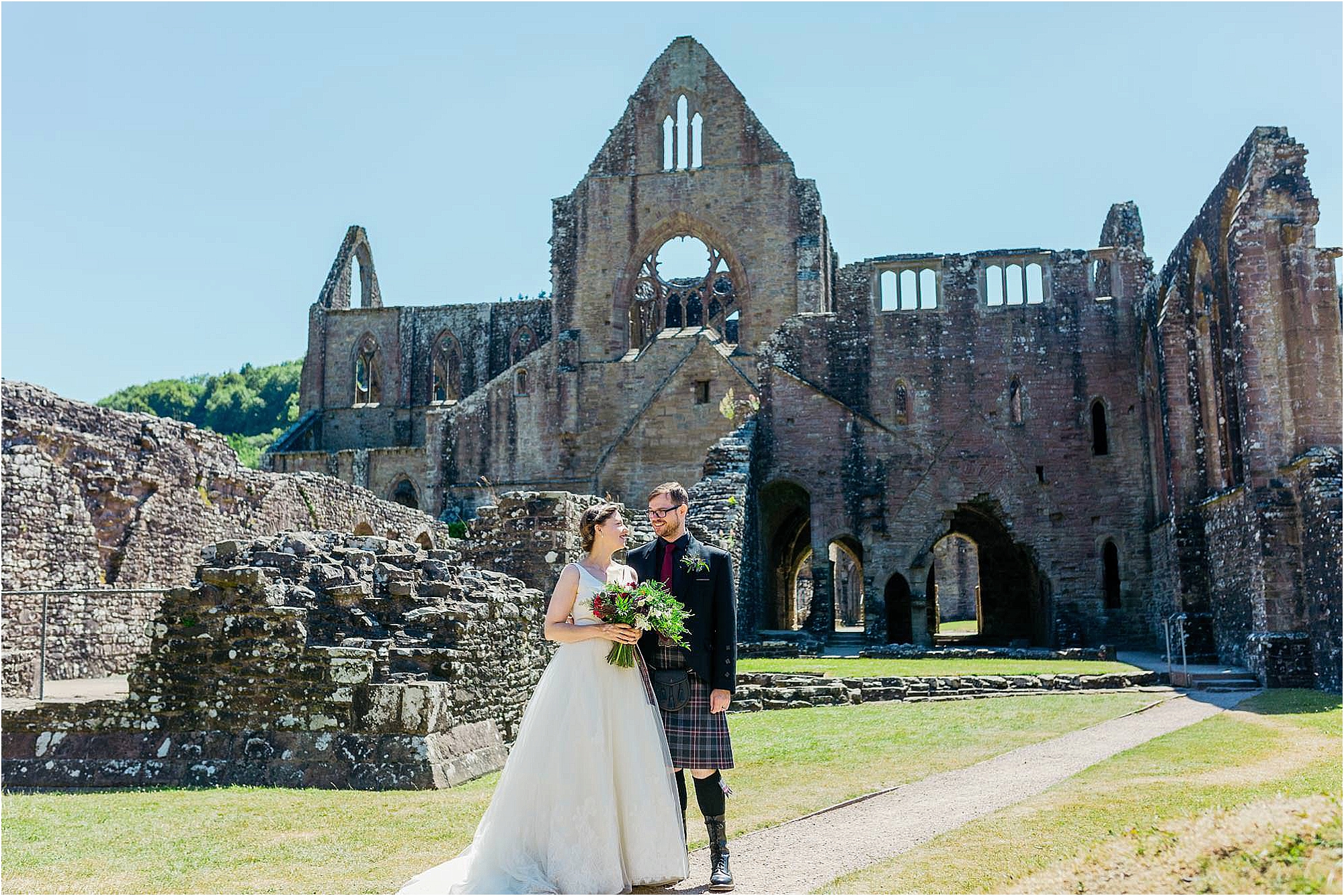 couple-standing-outside-tintern-abbey