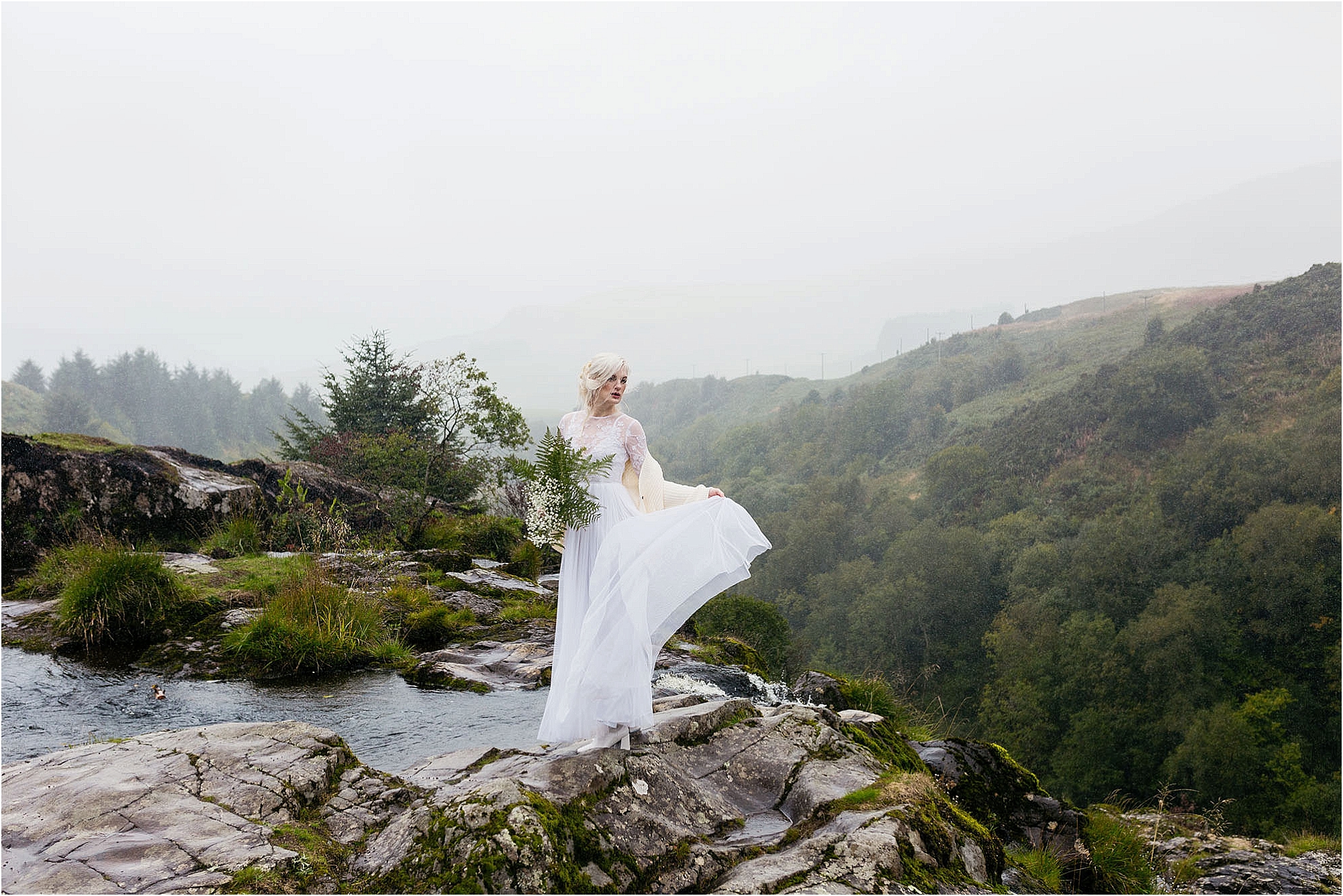 bride-standing-on-top-of-fintry-waterfall