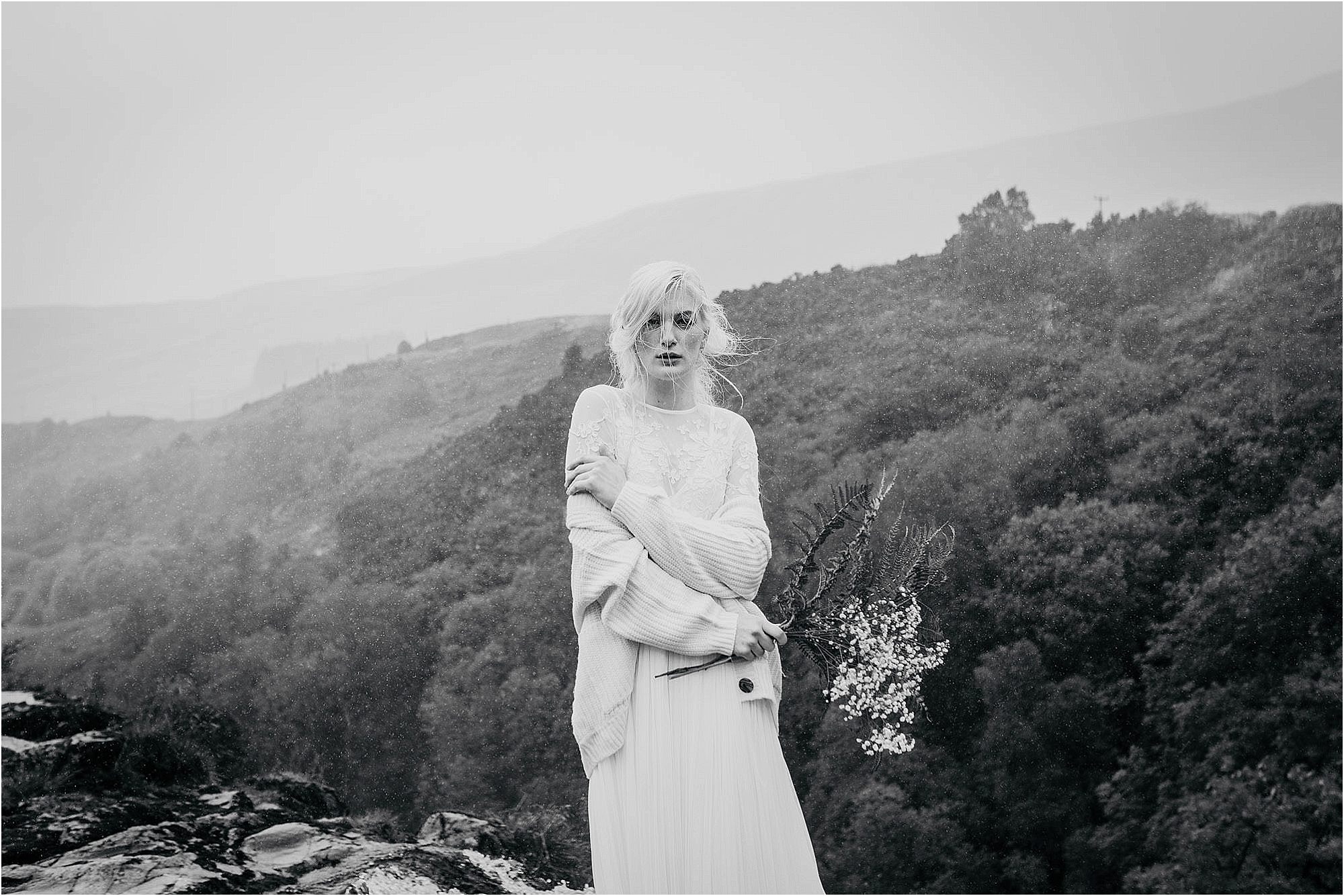 black-and-white-photo-of-bride-in-rain