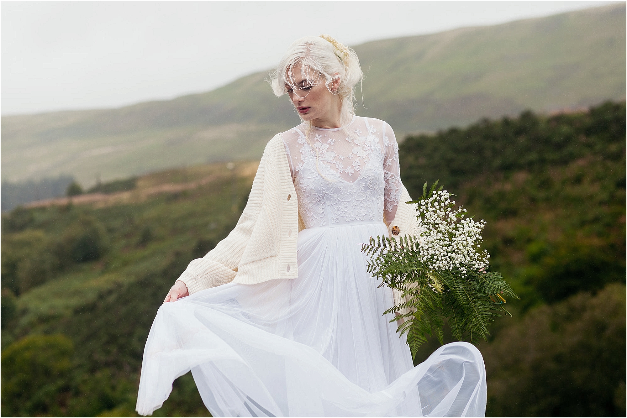 bride-wearing-cardigan-swishing-dress