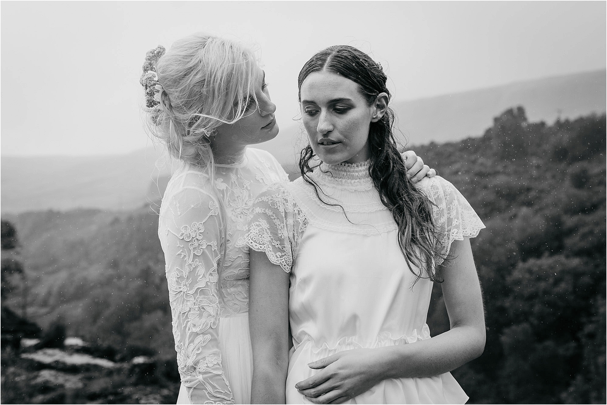 black-and-white-photo-two-brides-embracing