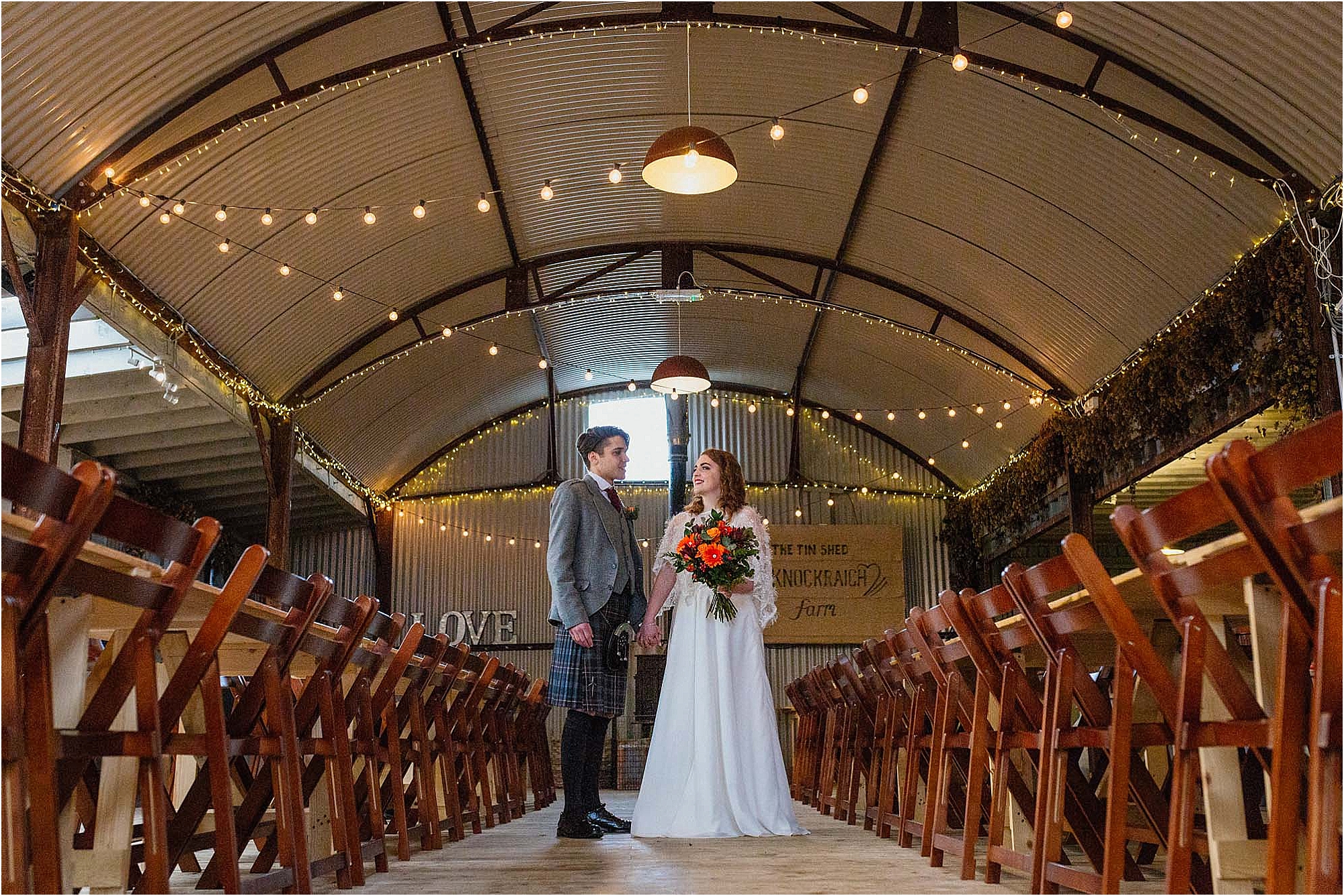 bride-groom-holding-hands-knockraich-farm-wedding
