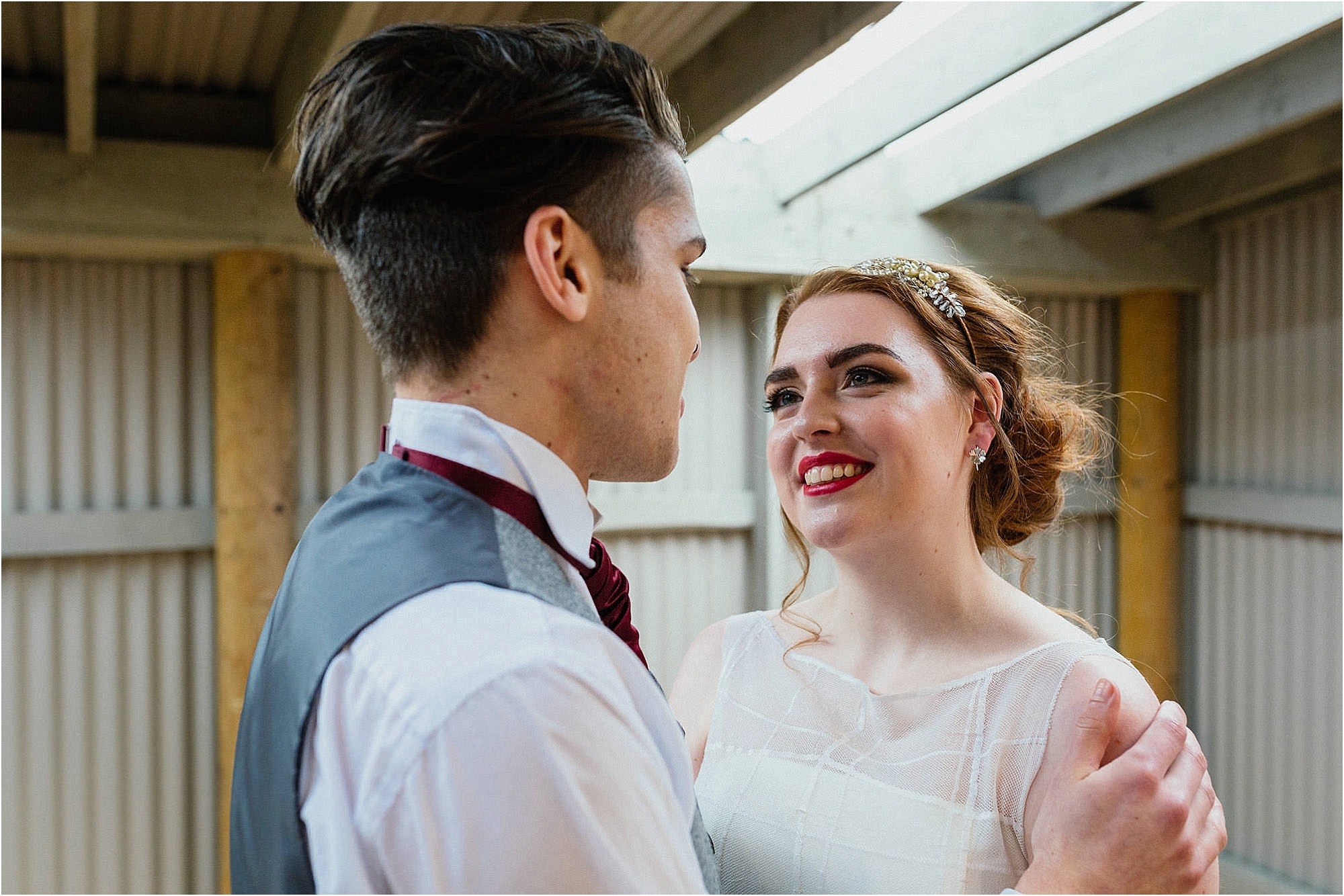 bride-looking-at-groom-smiling
