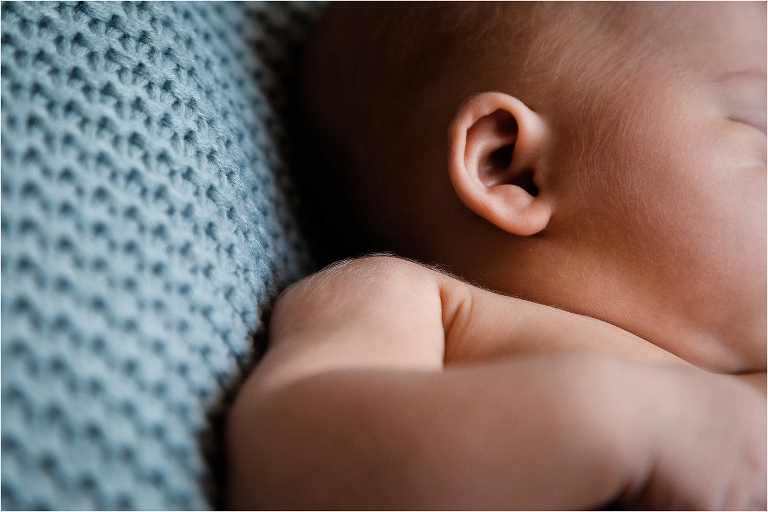 close-up-of-newborn-babys-fine-hairs-on-shoulder
