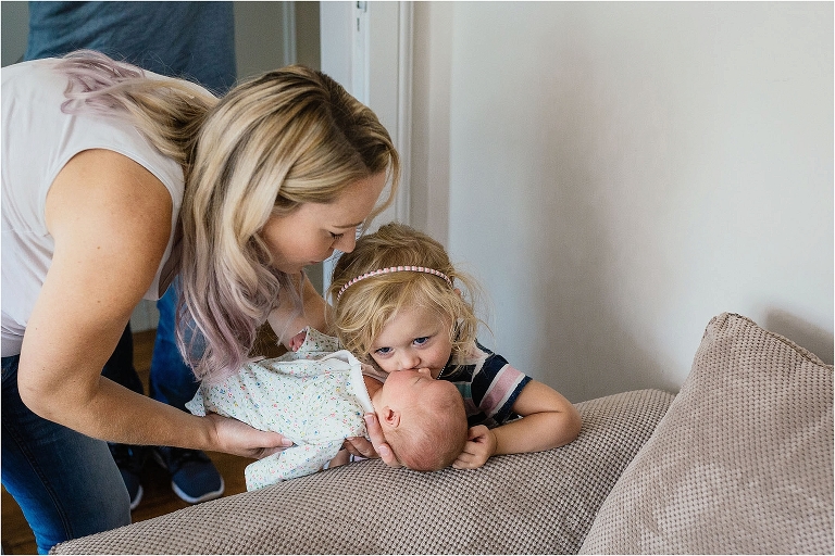 sister-kissing-her-baby-sister