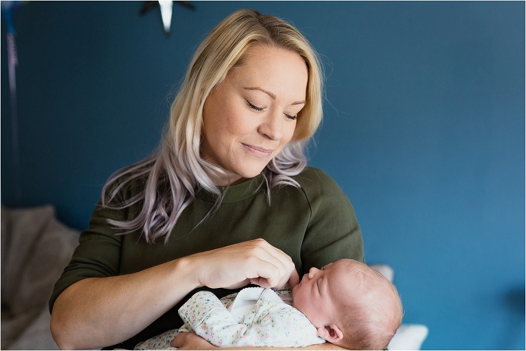 mum-looking-lovingly-at newborn-daughter