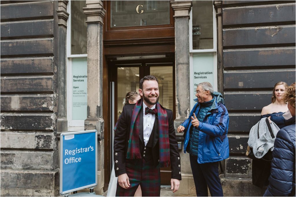 groom-laughing-at-camera