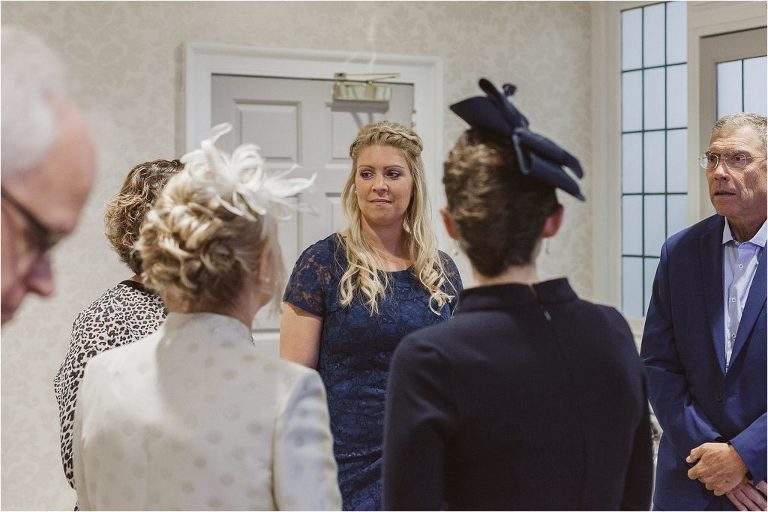 guest-at-wedding-wearing-blue-lace-dress