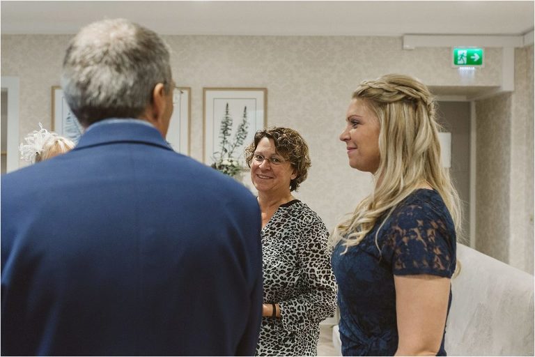 guest-at-wedding-smiling-at-camera