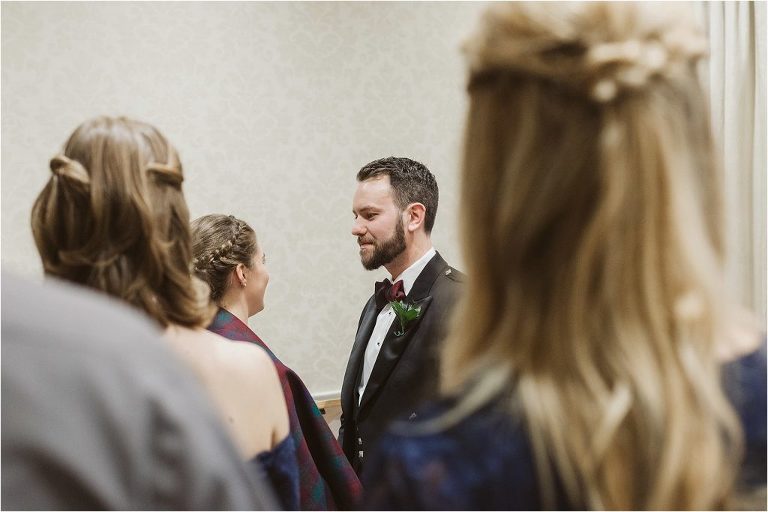 groom-looking-loving-at-bride