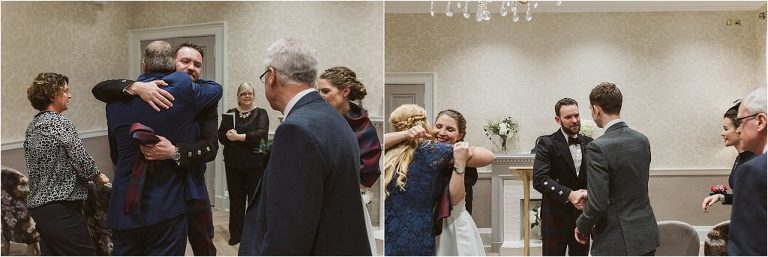 groom-hugging-family-members