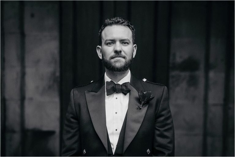 black-and-white-portrait-of-groom