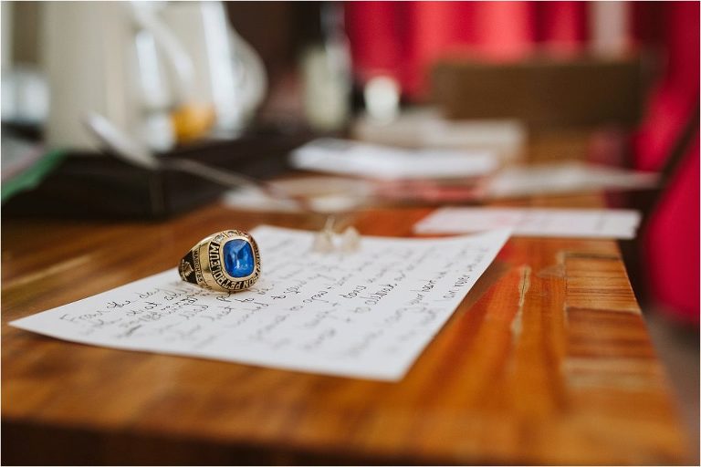 close-photo-of-grooms-blue-signet-wedding-ring