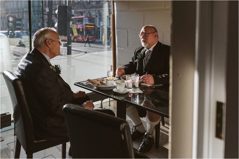groom-having-breakfast-with-father