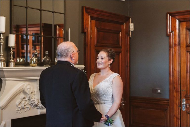 bride-smiling-at-groom-while-exchanging-vows