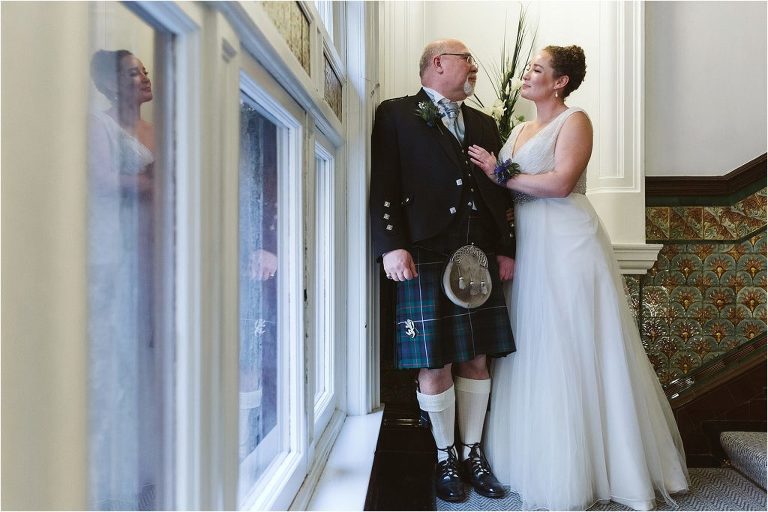 groom-and-bride-posing-for-photographs