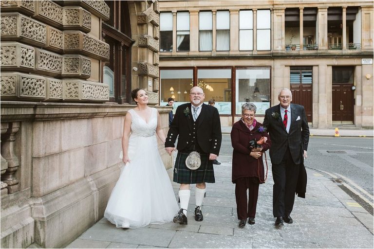 family-walking-together-down-the-street